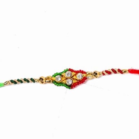 Diamond Studded Dial with Zardoshi Strings Rakhi