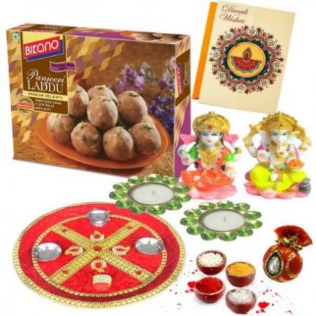 Diwali Puja thali with Panjeeri laddoo